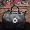 Sac Bowling Français Hippocampe Chaussures & Accessoires Mademoiselle Hélène Sac bowling brillant de la marque "Hippocampe". intérieur spacieux avec poche intégrée, fermeture zippée. Couleur noir Fabrication Française.