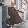 Robe longue plissée femme Robes / Combinaisons / Salopettes Mademoiselle Hélène Robe longue plissée manches longues à encolure ronde, disponible en noir et marron.